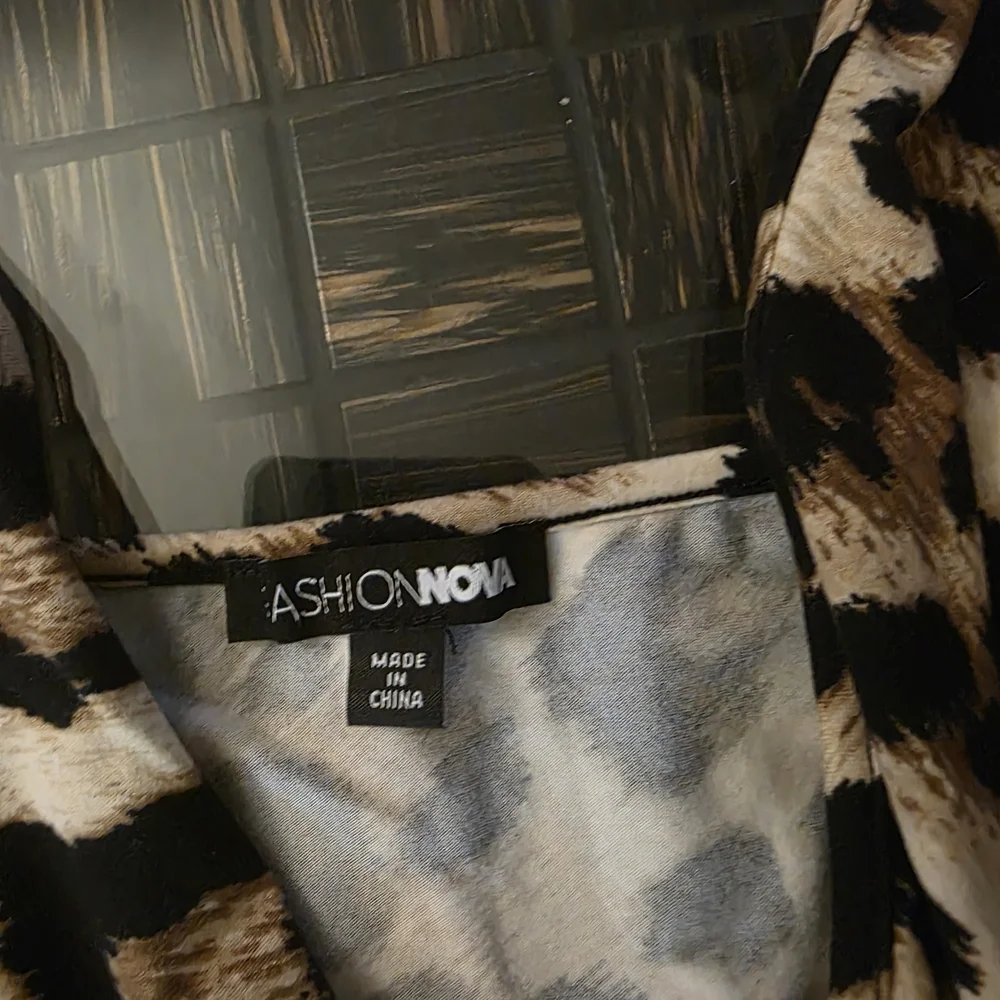 Fashion Nova Animal Print Romper - Picture 3 of 5